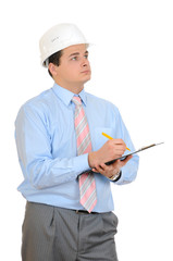 An engineer holding clipboard and hard hat on white