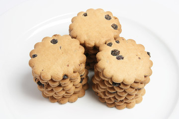 Raisin Biscuits Stacked on Plate