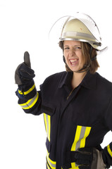 Junge Feuerwehrfrau in Uniform, Lachen