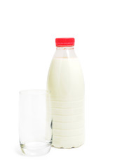 Milk in the bottle on white background