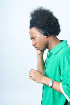 Black Teenager listen to music