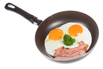 A fried egg with bacon