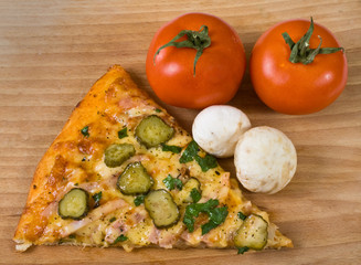 Pizza slice with tomatoes