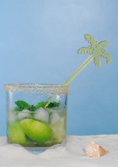 Cocktail Mojito, Ice, Mint, Sugar and Palmtree Stirring Straw