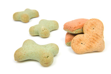Funny shaped dog cookies over white background