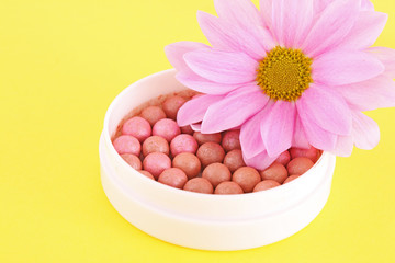 rouge with flower  on the yellow  background