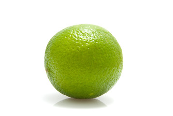 Fresh green lime over white background