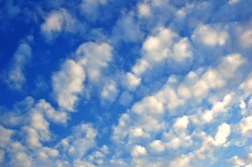 bright blue sky with many white clouds