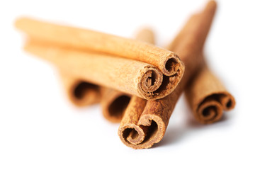 Cinnamon sticks on white