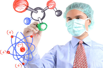 Researcher drawing molecule structures and atom symbols on glass