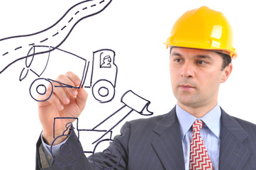 An engineer drawing production plan of a construction site