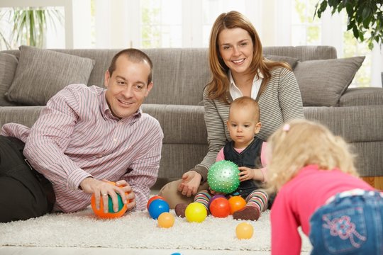 Family playing with balls