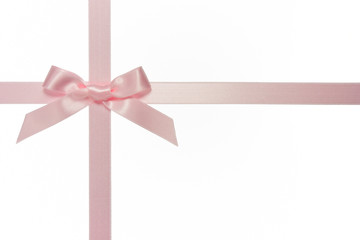 pink cross ribbon with bow isolated