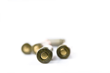 Bullets on the white surface