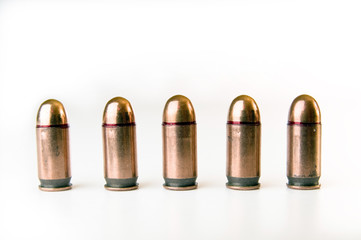 Bullets on the white surface