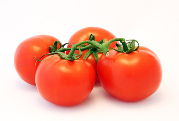 Four ripe red tomatoes