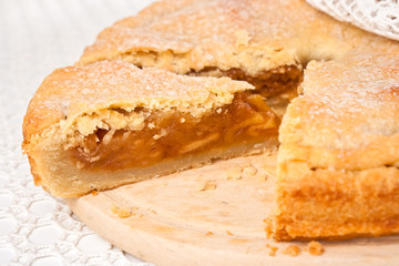 The cut off piece from an apple pie