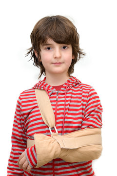 Boy with sling on broken arm