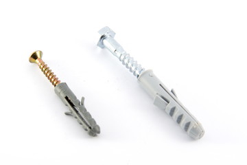 Screws with plastic dowels