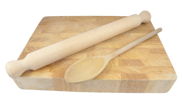 rolling pin on chopping board isolated on white