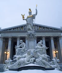 Fototapeten Vienna - parliament and Athena fountain in winter mornig © Renáta Sedmáková