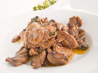 Mushrooms cooked with olive oil, tomato sauce and parsley.