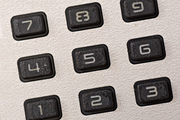 pad of old calculator with numeric buttons
