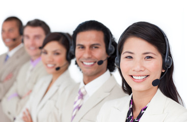 Enthusiastic business team lining up with headset on