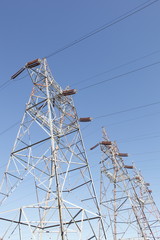 Power lines on a tower.