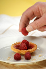 home made jam tarts with sweet raspberries