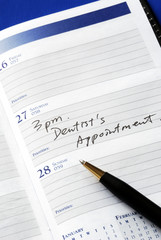 Write down the appointment in a day planner