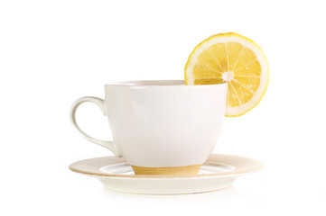 full cup of tea with lemon