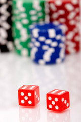 Colorful poker chips and dices