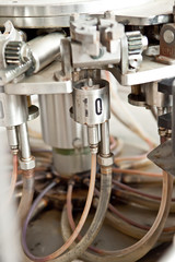 A winery capping and labeling bottle machine