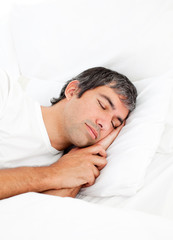 Fototapeta na wymiar Portrait of an attractive man sleeping