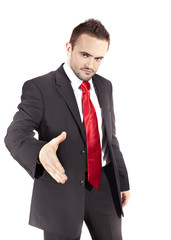 young businessman extending his hand