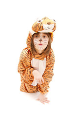 little girl wearing tiger costume isolated on white