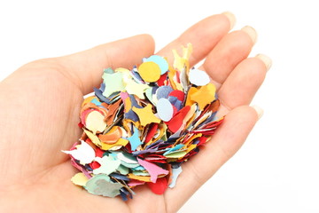 Confettis dans la main