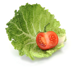 Organic Sliced Tomato on Cabbage Leaf