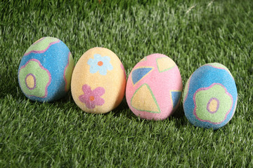 Decorated Easter eggs in the grass
