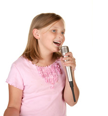 young girl singing karaoke on white