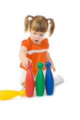 Little funny girl with toys