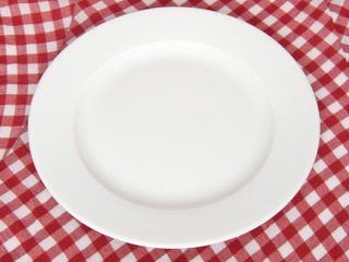 white plate on the tablecloth