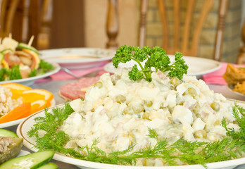 Tasty Russian salad. Banquet in the restaurant