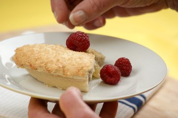 home made bramley apple pie with raspberries