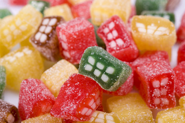 background of delicious sweet candies in sugar