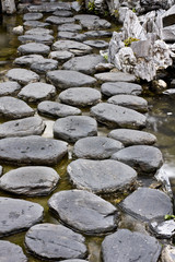 traditional stone road in a lake in China