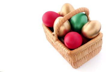 Easter egg in wicker basket