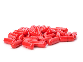 red capsules isolated on white background