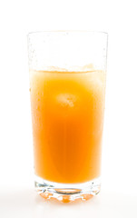 glass of orange juice with ice